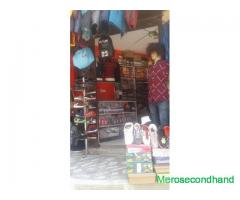 Man wear fancy shop for sell at Dallu